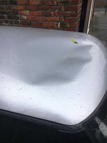 Car roof dent removal