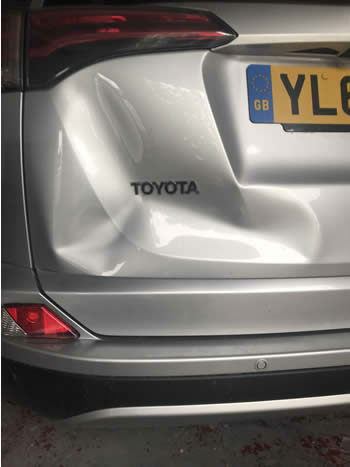 Car tailgate dent removal
